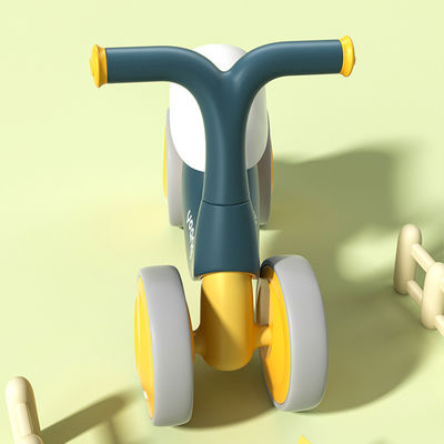 Orange Plastic Baby Walker Balance Car con pattinaggio a rulli silenzioso e design verde