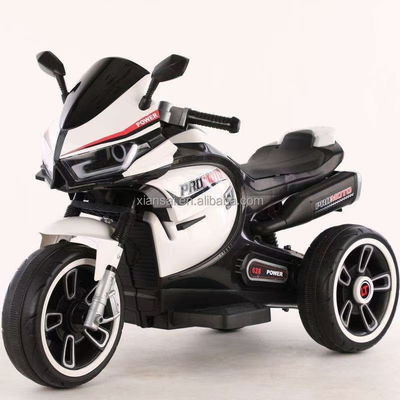 Bianco triciclo motociclo elettrico per bambini con luce colorata e 380 * 2 motore