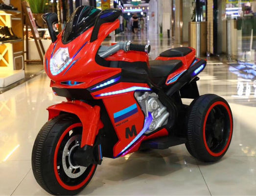 Bambini dai 2 agli 8 anni in moto con musica e luce / batteria ricaricabile 12V