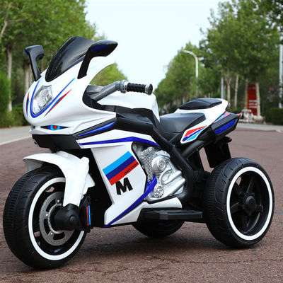 Bambini dai 2 agli 8 anni in moto con musica e luce / batteria ricaricabile 12V