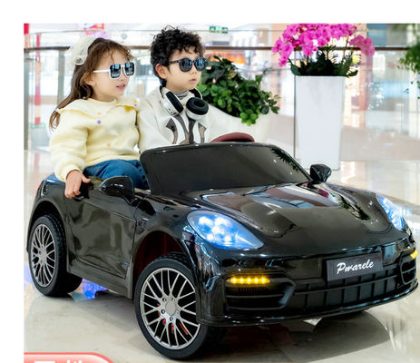 2023 Plastic 12V Electric Ride On Car per bambini 2 posti a sedere Peso di carico 60 kg Beneficio