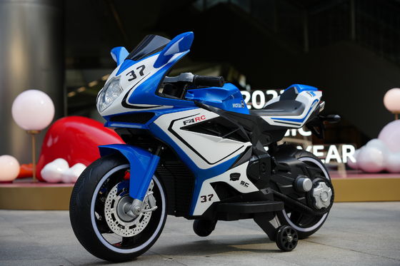 Prodotto 12V Electric Ride-On Motorcycle Car con musica e illuminazione a LED per bambini
