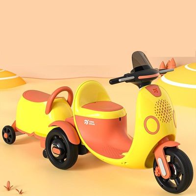 Triciclo elettrico per bambini in plastica con luce musicale per una corsa eccitante