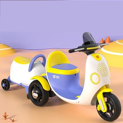 Triciclo elettrico per bambini in plastica con luce musicale per una corsa eccitante